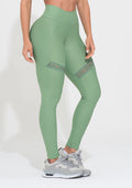 Legging Fitness Feminina Verde com Recorte e Elástico Vazado Action Dlk
