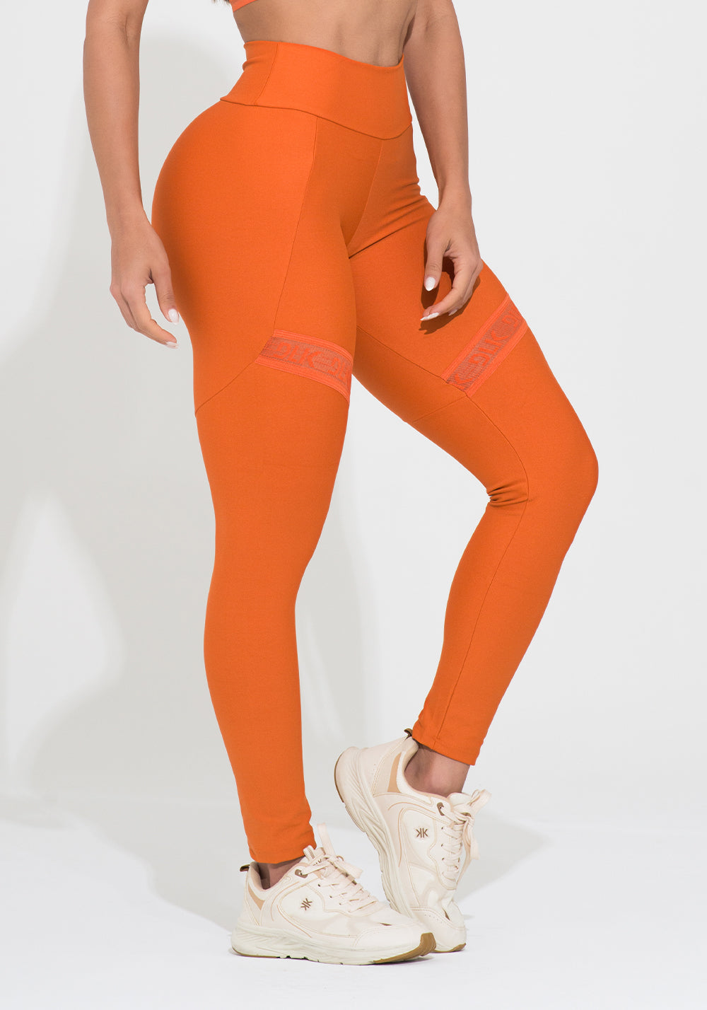 Legging Fitness Feminina Laranja Com Recorte E Elástico Vazado Action Dlk