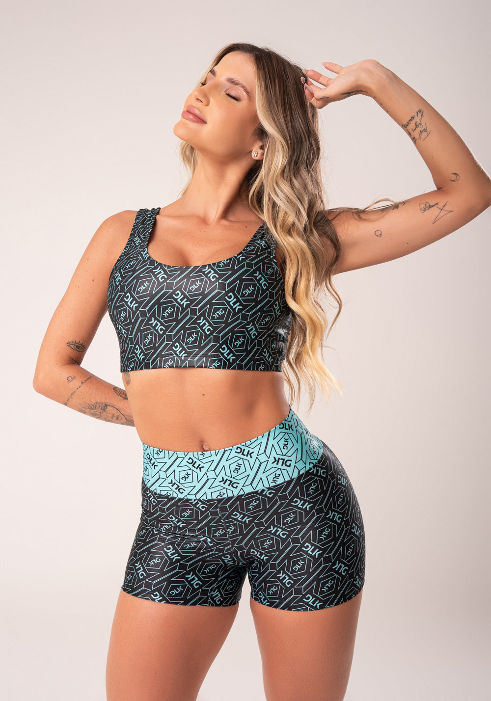 Top Fitness Feminino Preto E Verde Logomania Flow Dlk