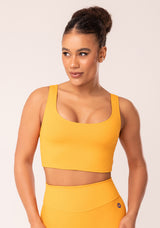 Top Cropped Fitness Feminino Amarelo Com Recortes Oasis Dlk