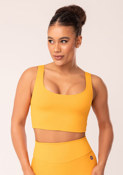 Top Cropped Fitness Feminino Amarelo Com Recortes Oasis Dlk