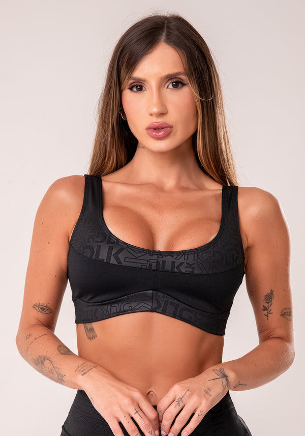 Top Fitness Feminino Preto Com Recortes Logomania Reflections Dlk