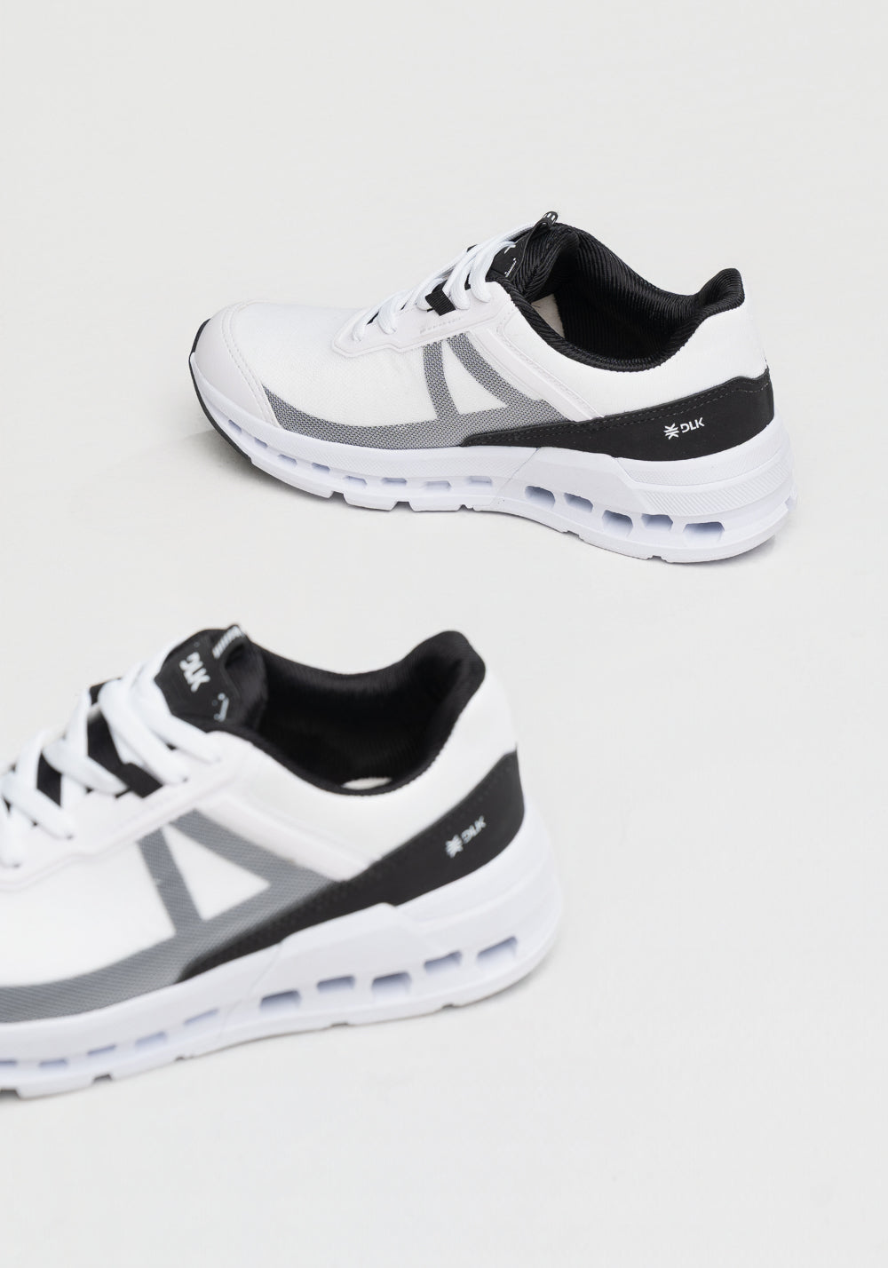 Tênis Esportivo Masculino com Detalhe No Solado Dlk Branco e Preto