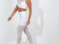 Top Fitness Feminino Branco Com Recortes Em Tela E Detalhe Vazado Intense Dlk